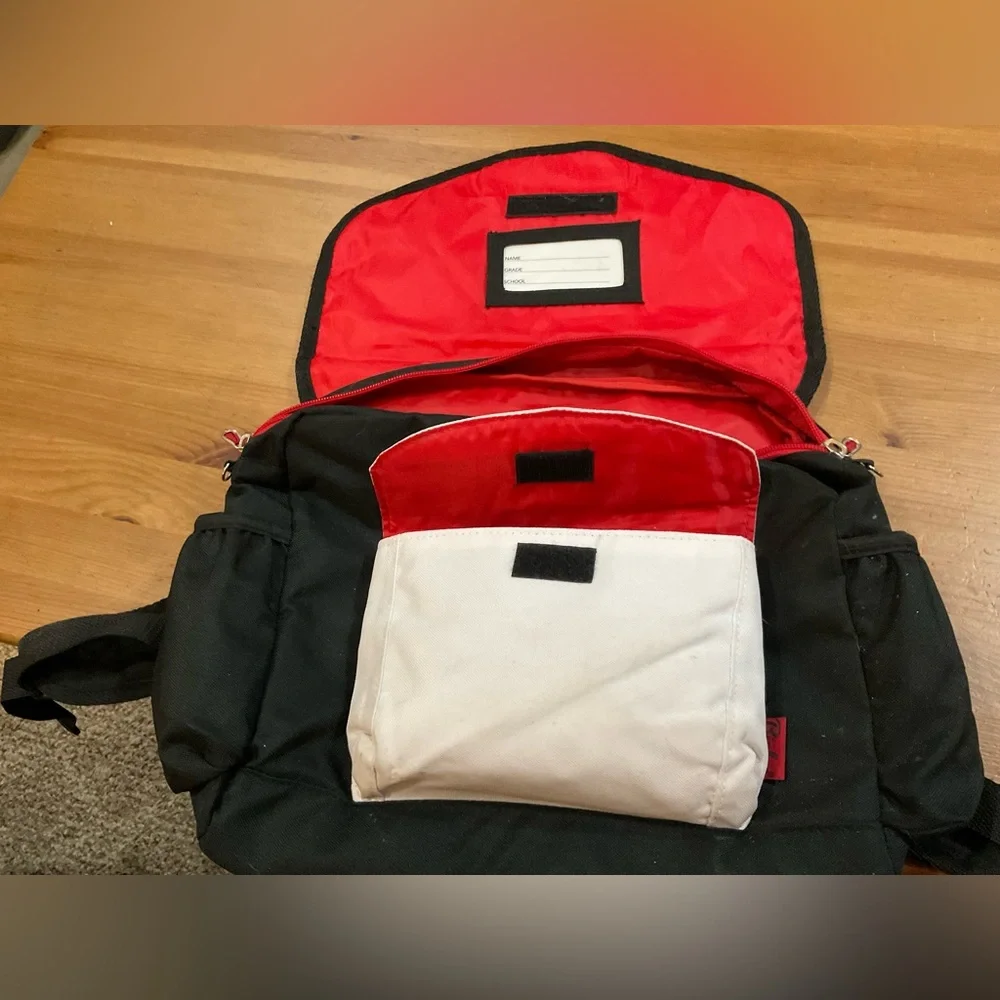 Bixbee Kids: (one here - one there) about/ approximately 16” inch backpack.
